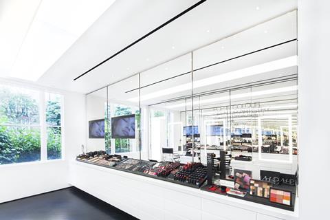 The interior is designed with clean, sharp lines with floor-to-ceiling images from Nars’ advertising campaign emblazoned on the walls